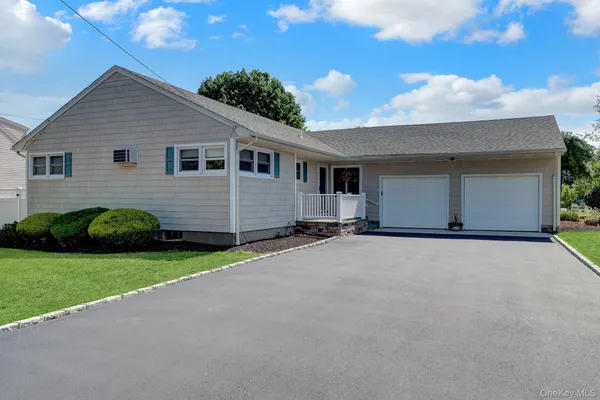 $895,000 | 12 Bainbridge Avenue, Melville, NY 11747