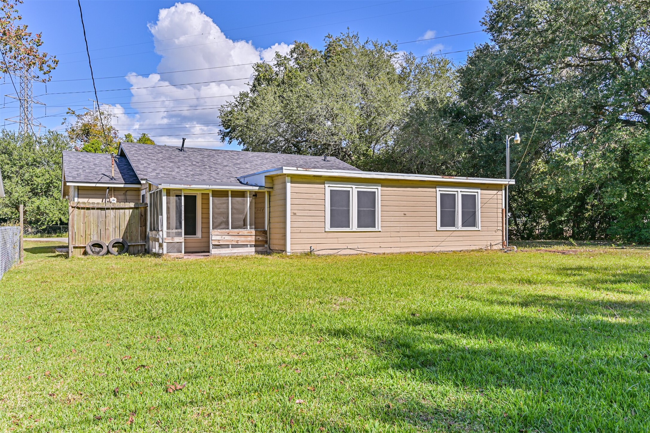 1007 Plum Street La Marque, TX 77568 - Photo 15 of 16 a front view of a house with a garden
