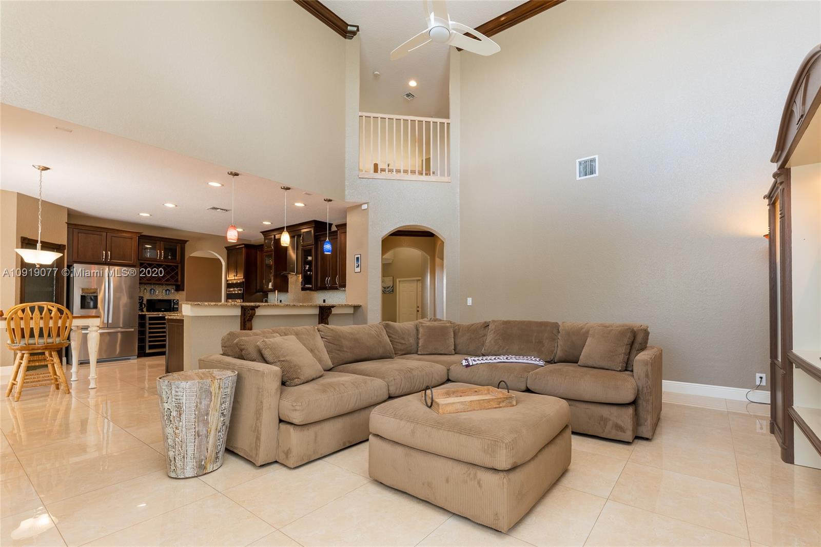 12358 St Simon Drive Boca Raton, FL 33428 - Photo 28 of 89 a living room with furniture and a fireplace