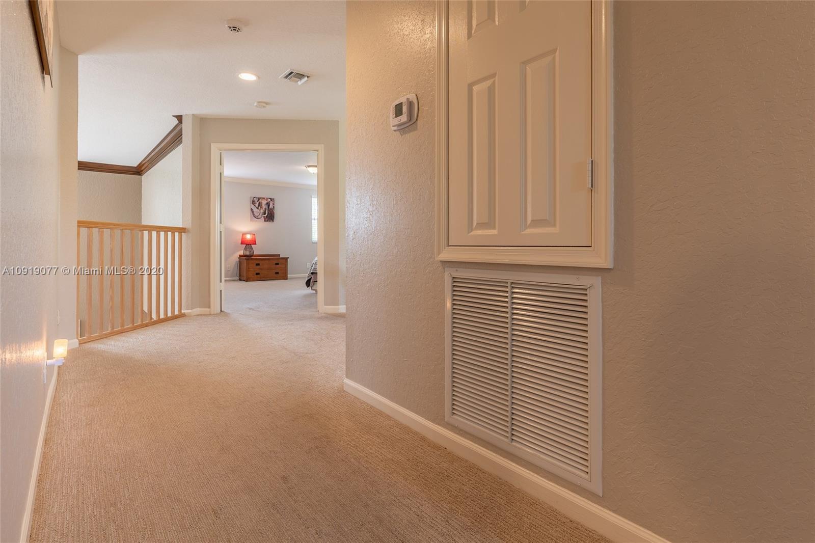 12358 St Simon Drive Boca Raton, FL 33428 - Photo 34 of 89 a view of a livingroom with a staircase