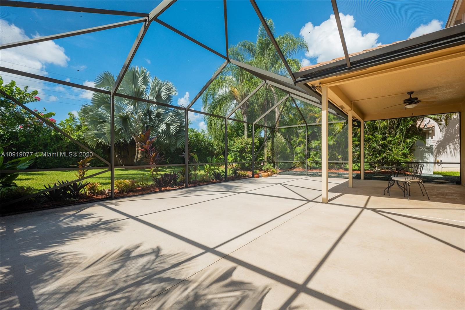 12358 St Simon Drive Boca Raton, FL 33428 - Photo 73 of 89 a view of backyard with wheel chair and potted plants