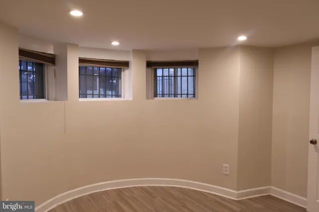 an empty room with windows