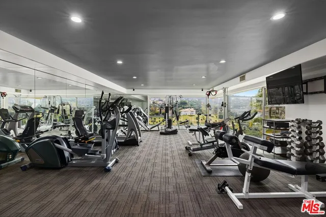 a view of a room with gym equipment