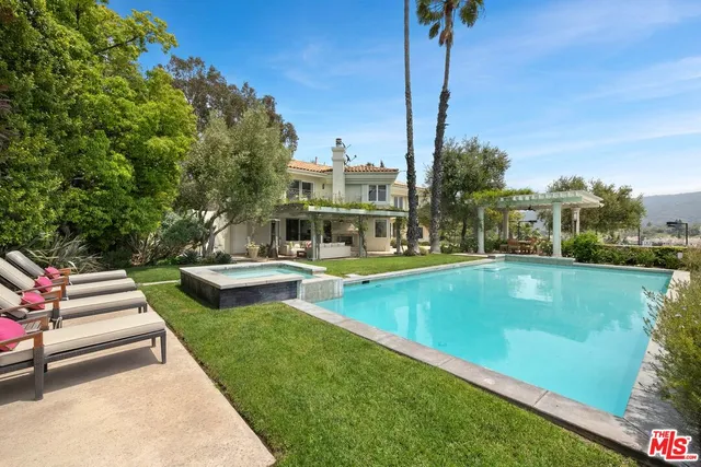 a view of outdoor space yard swimming pool and patio