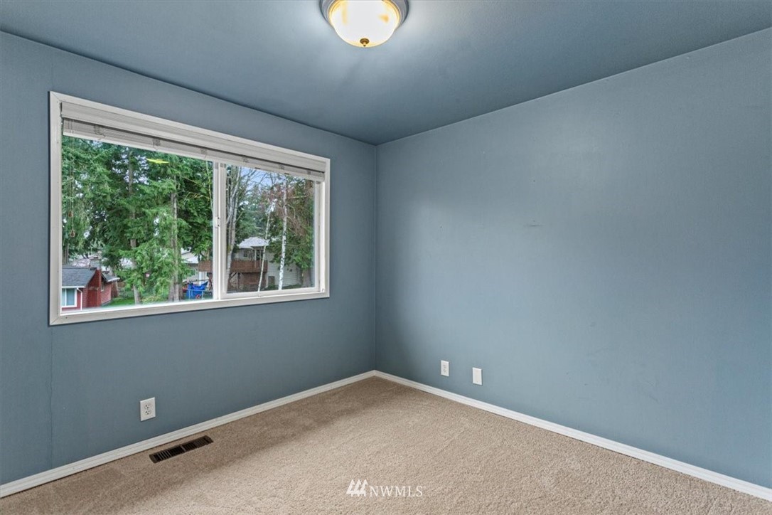 21918 7th Place West Bothell, WA 98021 - Photo 12 of 25 an empty room with a window