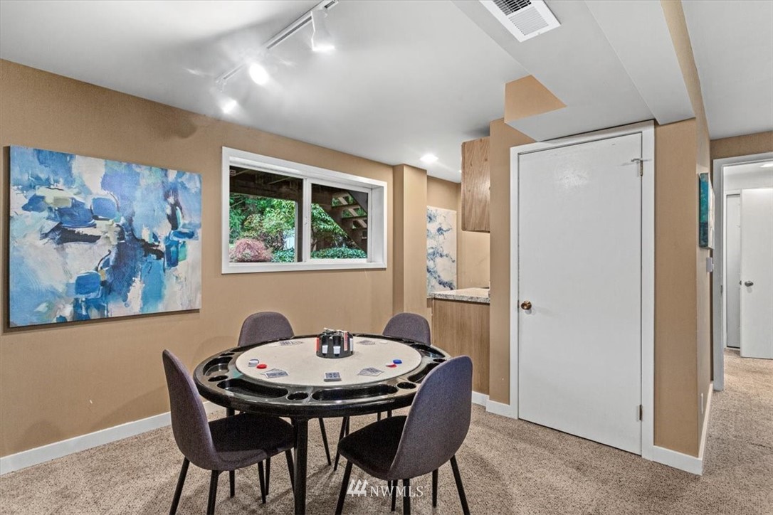 21918 7th Place West Bothell, WA 98021 - Photo 20 of 25 a view of a dining room with furniture window and wooden floor