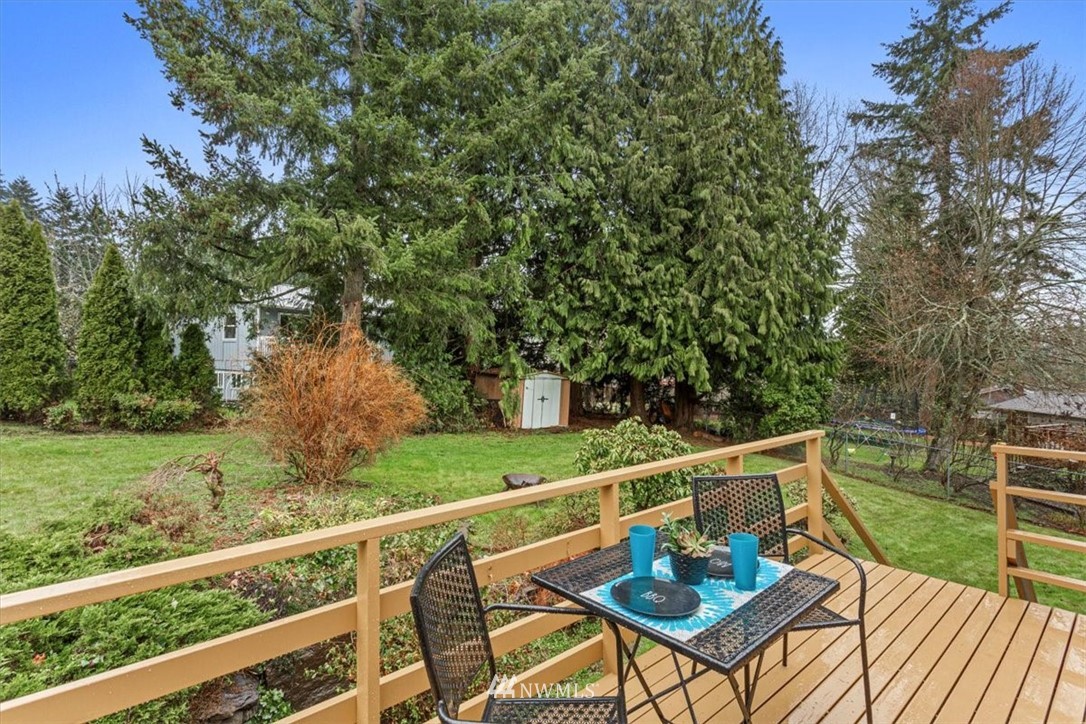 21918 7th Place West Bothell, WA 98021 - Photo 22 of 25 a view of a chairs and table on the deck