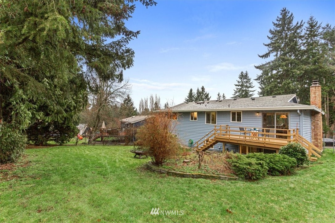 21918 7th Place West Bothell, WA 98021 - Photo 25 of 25 a front view of a house with a garden