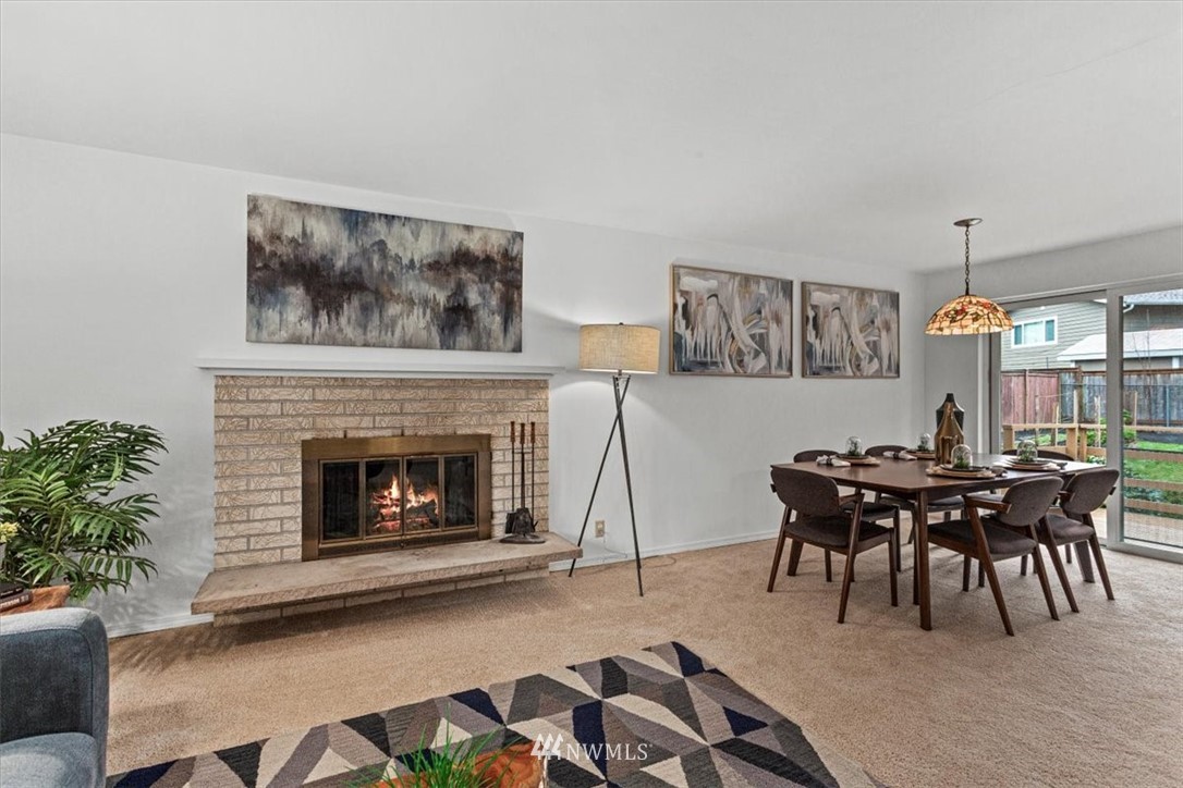 21918 7th Place West Bothell, WA 98021 - Photo 5 of 25 a view of a livingroom with furniture and a fireplace