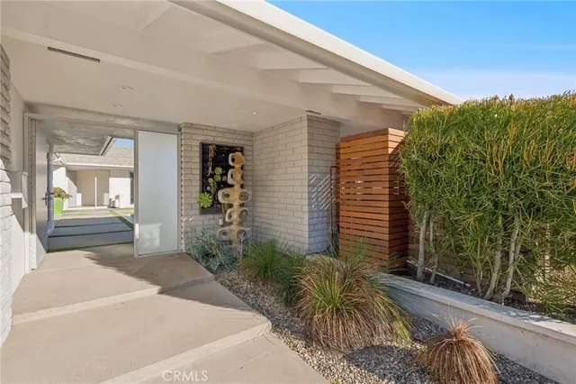 a house view with a outdoor space