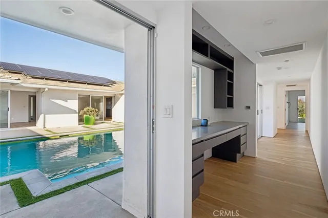 a view of living room kitchen