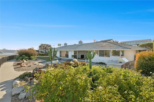 a view of a lake with a yard