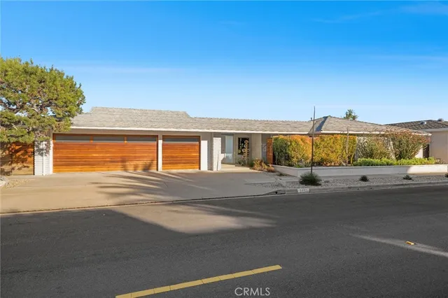 front view of a house with a street