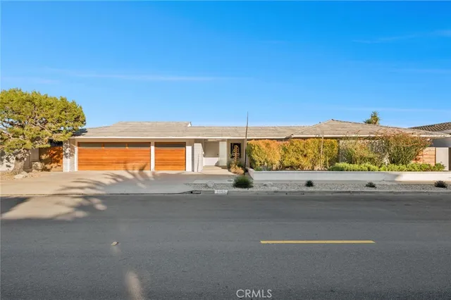 a view of a road with a building in the background