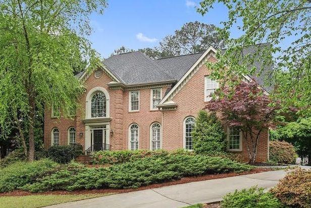 1040 Rugglestone Way Johns Creek, GA 30097 - Photo 1 of 1 Beautiful traditional home with professional landscaping and a private backyard.