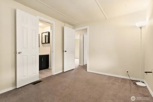 a view of a room with white walls