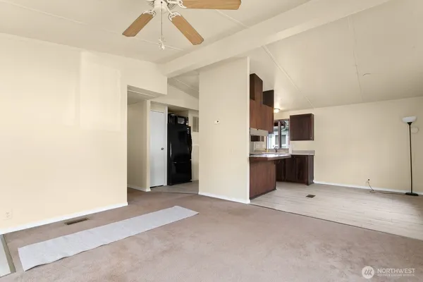 a view of a kitchen with a sink