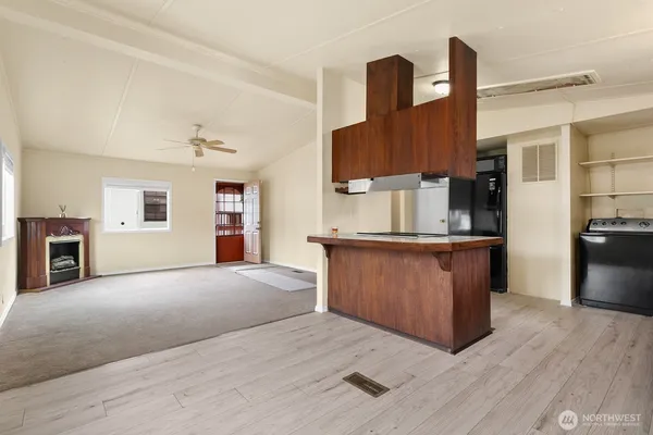 a view of kitchen and living room