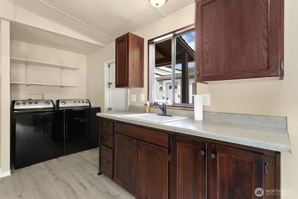 a kitchen with a sink and a cabinets