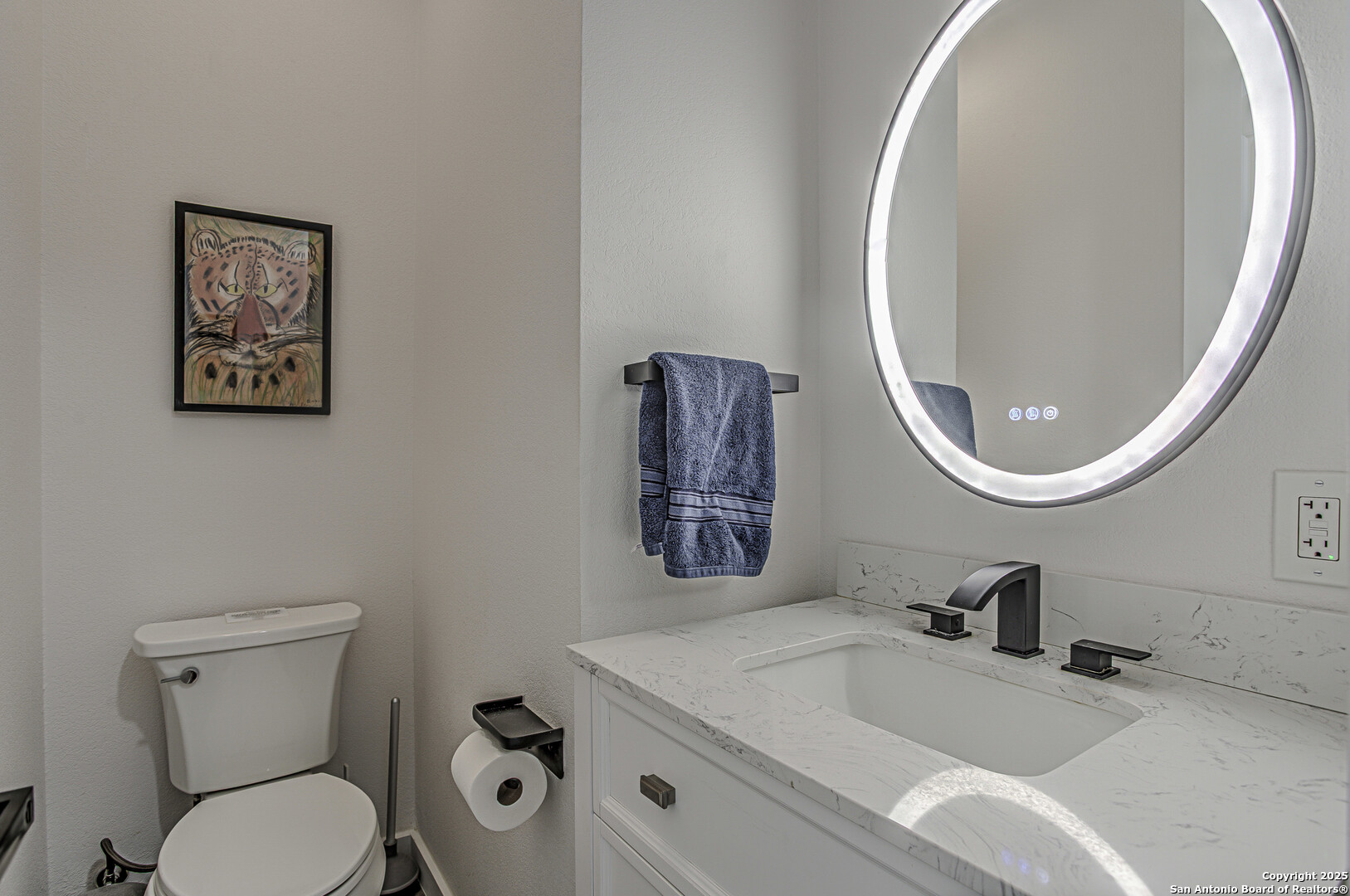2705 Campestres Spring Branch, TX 78070 - Photo 11 of 35 a bathroom with a toilet a sink and mirror