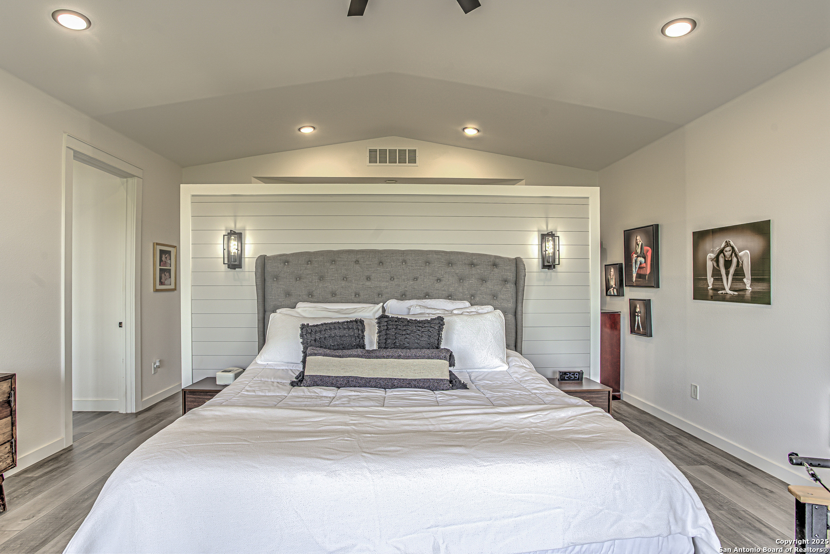 2705 Campestres Spring Branch, TX 78070 - Photo 12 of 35 a spacious bedroom with a bed and a fireplace