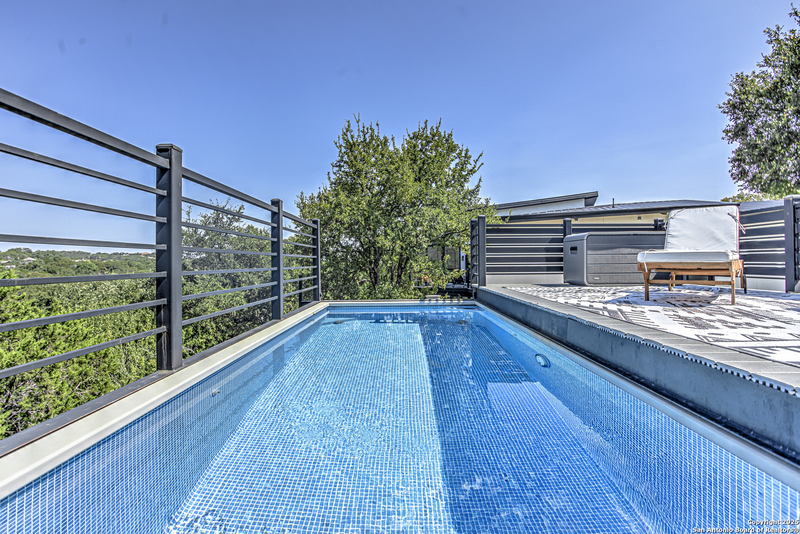 2705 Campestres Spring Branch, TX 78070 - Photo 2 of 35 a view of a swimming pool with a patio