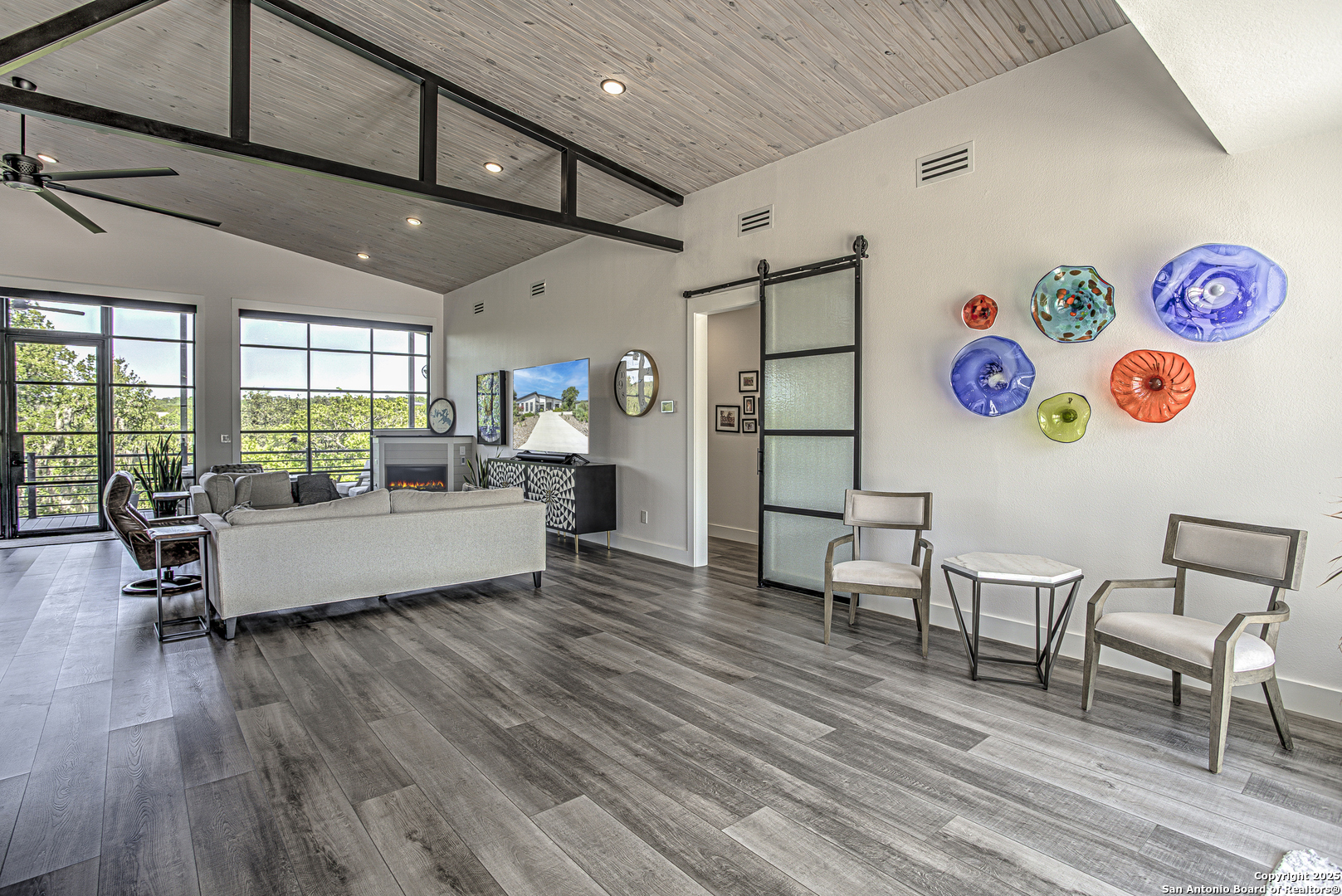 2705 Campestres Spring Branch, TX 78070 - Photo 21 of 35 a living room with furniture and a wooden floor