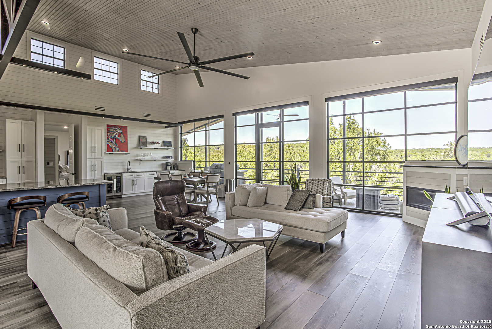 2705 Campestres Spring Branch, TX 78070 - Photo 23 of 35 a living room with furniture and floor to ceiling windows