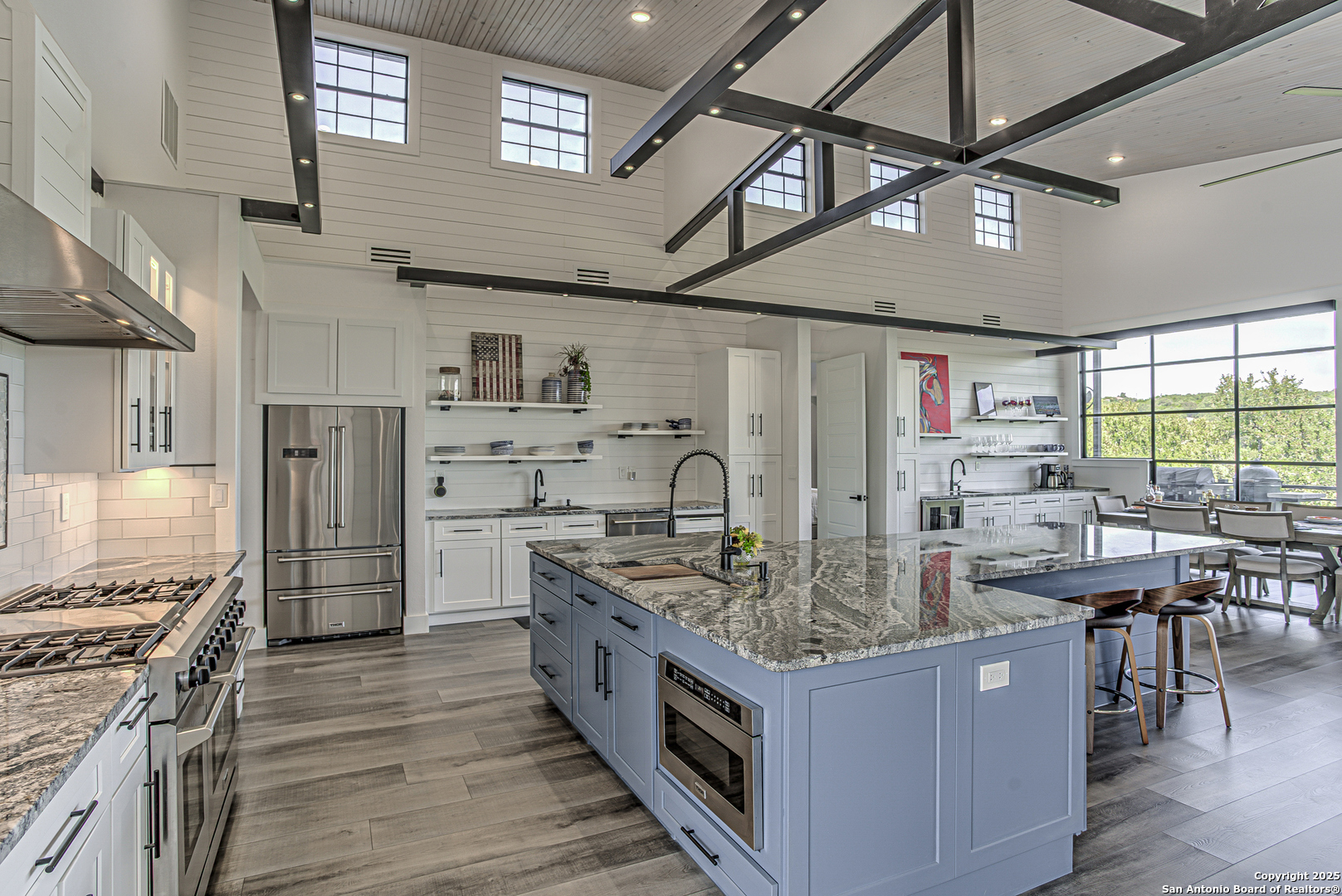 2705 Campestres Spring Branch, TX 78070 - Photo 27 of 35 a kitchen with stainless steel appliances granite countertop a wooden cabinets and a stove