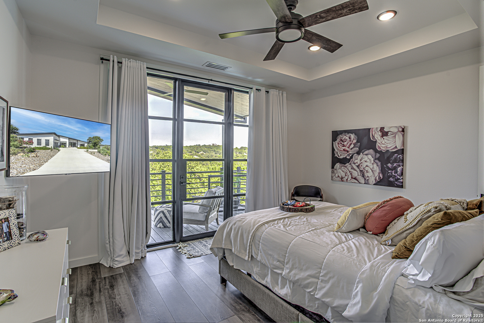 2705 Campestres Spring Branch, TX 78070 - Photo 4 of 35 a bedroom with a bed and a large window