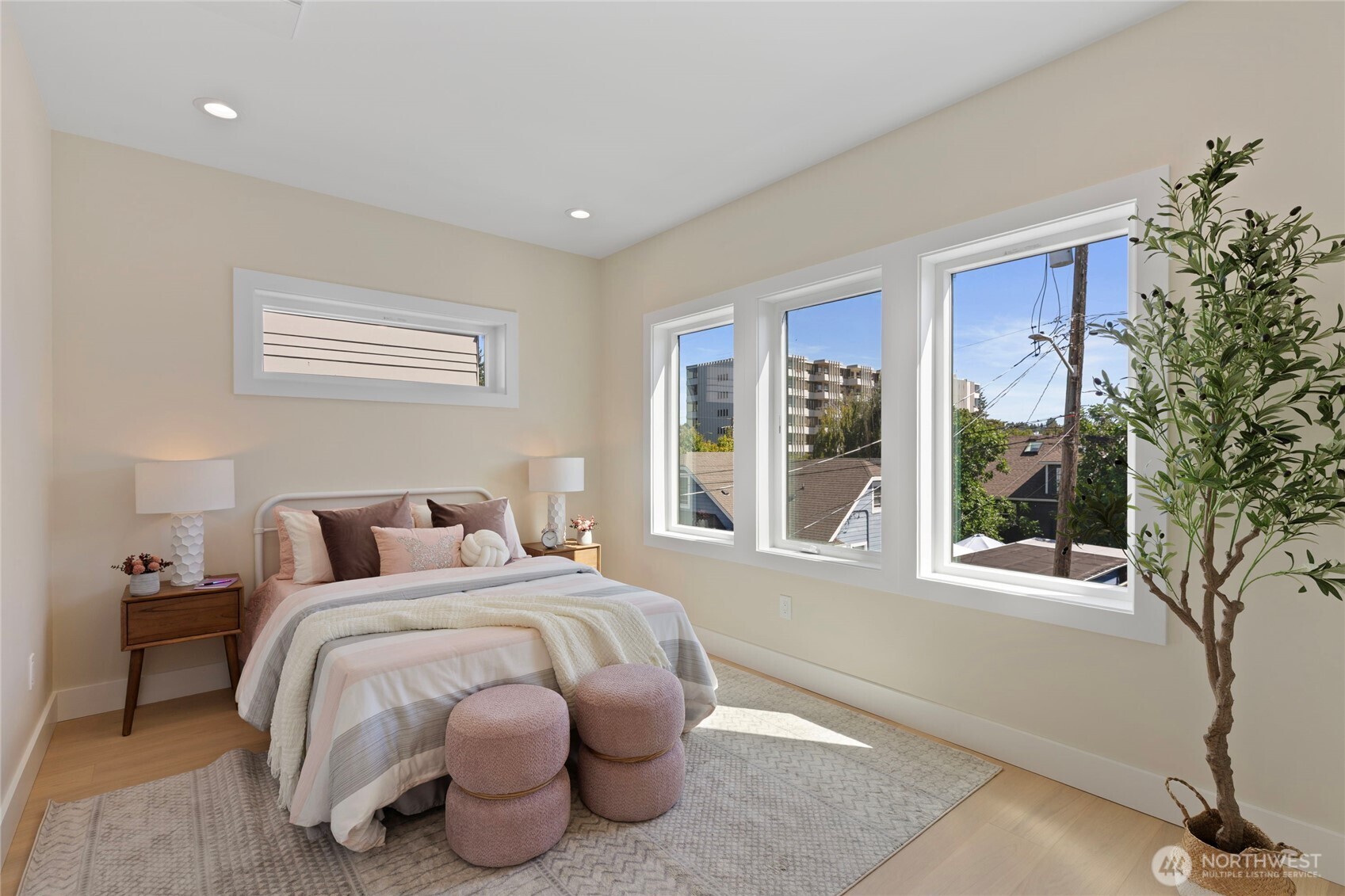 6543 Chapin Place North Seattle, WA 98103 - Photo 20 of 40 a bed room with a bed and a large window