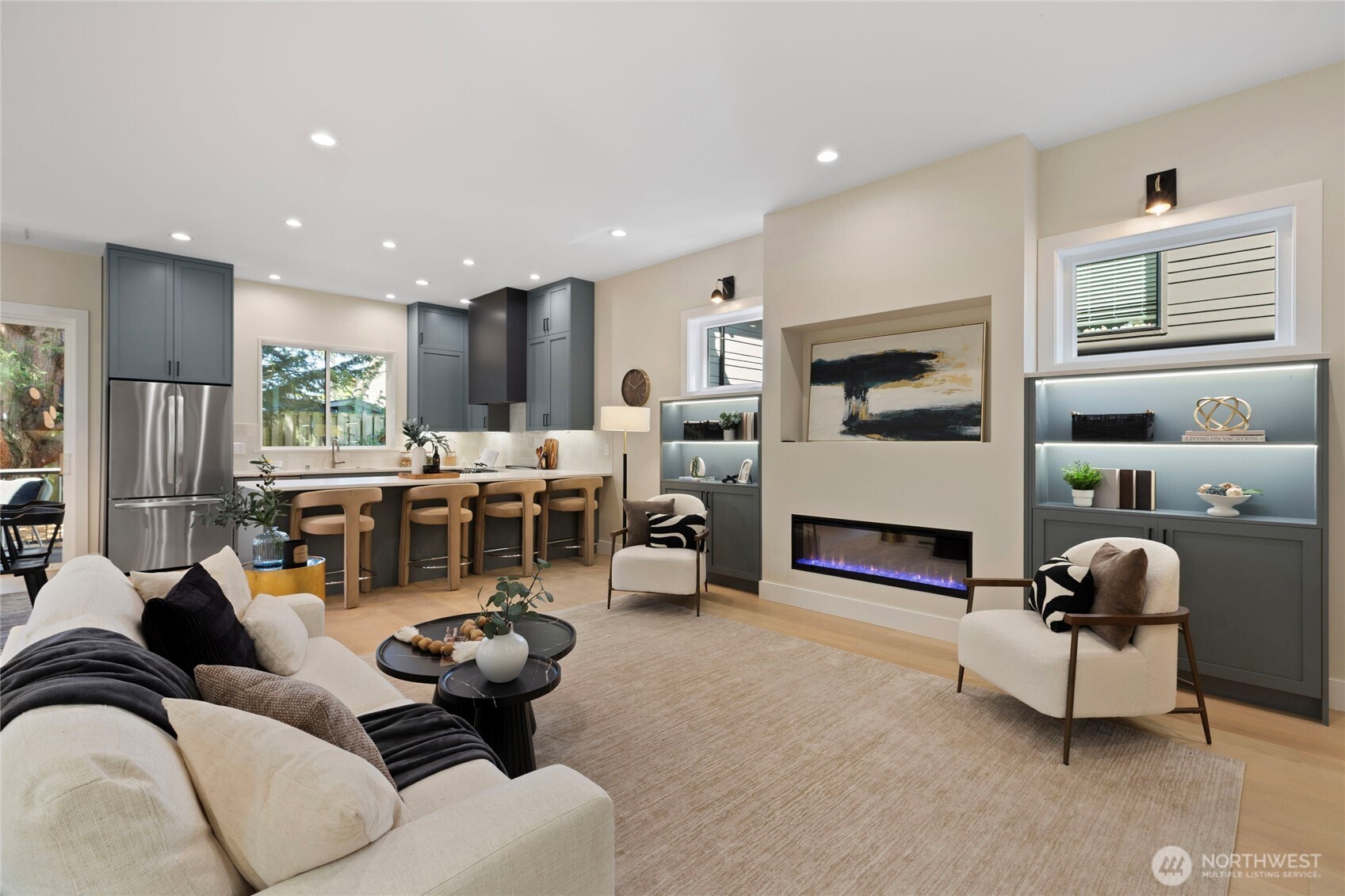 6543 Chapin Place North Seattle, WA 98103 - Photo 24 of 40 a living room with furniture and a fireplace