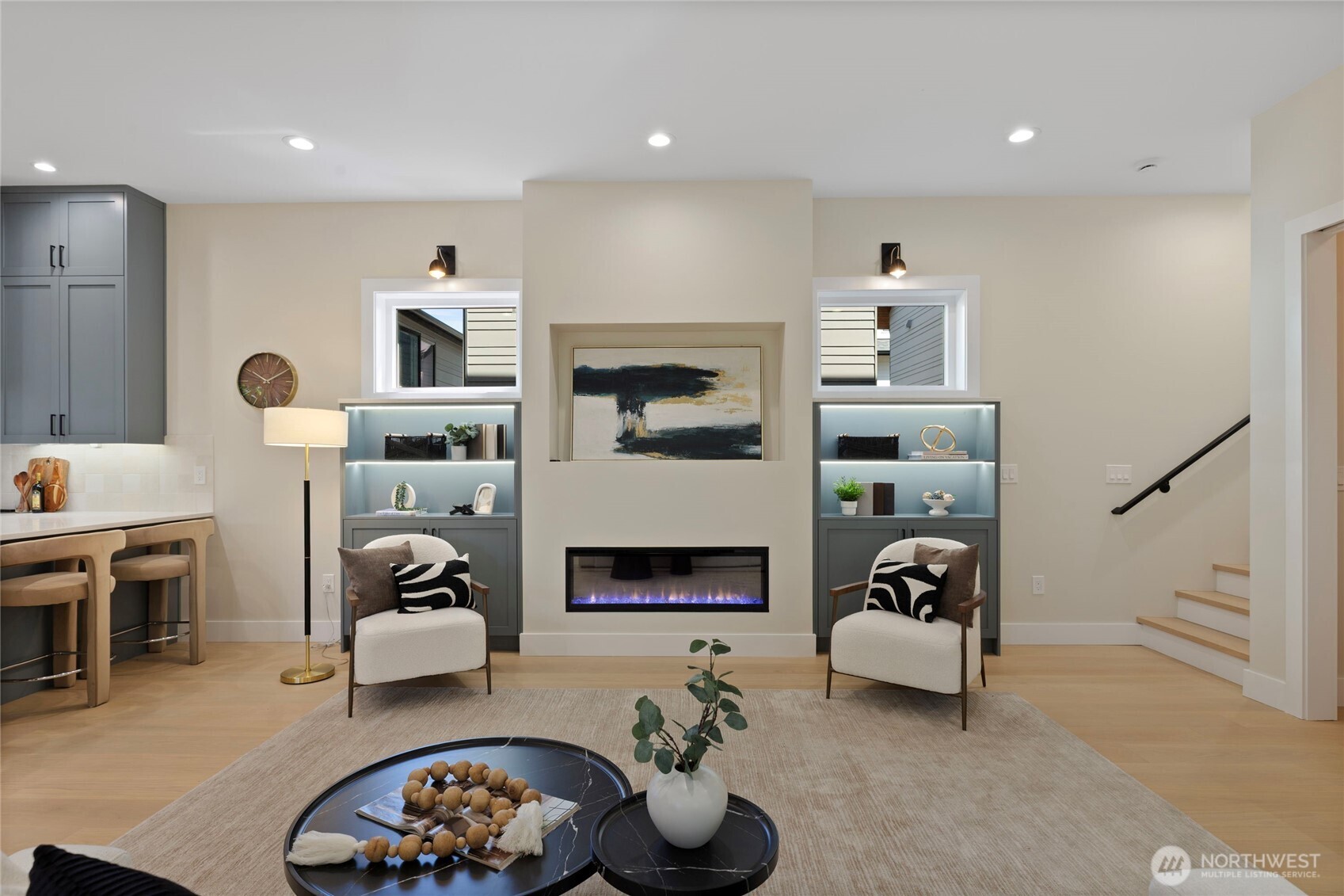 6543 Chapin Place North Seattle, WA 98103 - Photo 28 of 40 a living room with furniture and a fireplace