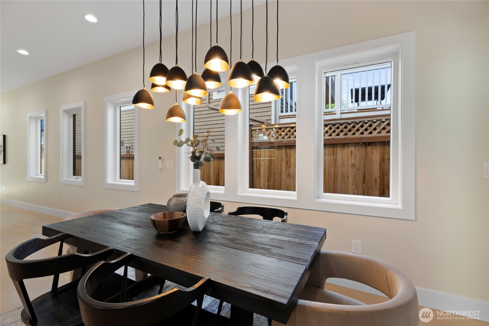 6543 Chapin Place North Seattle, WA 98103 - Photo 6 of 40 a view of a dining room with furniture and chandelier