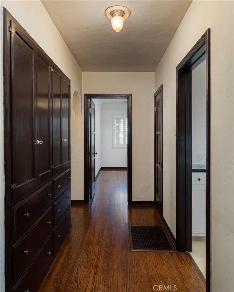 2824 Chestnut Avenue Long Beach, CA 90806 - Photo 23 of 46 hallway to all bedrooms and to kitchen, lots of cabinet storage