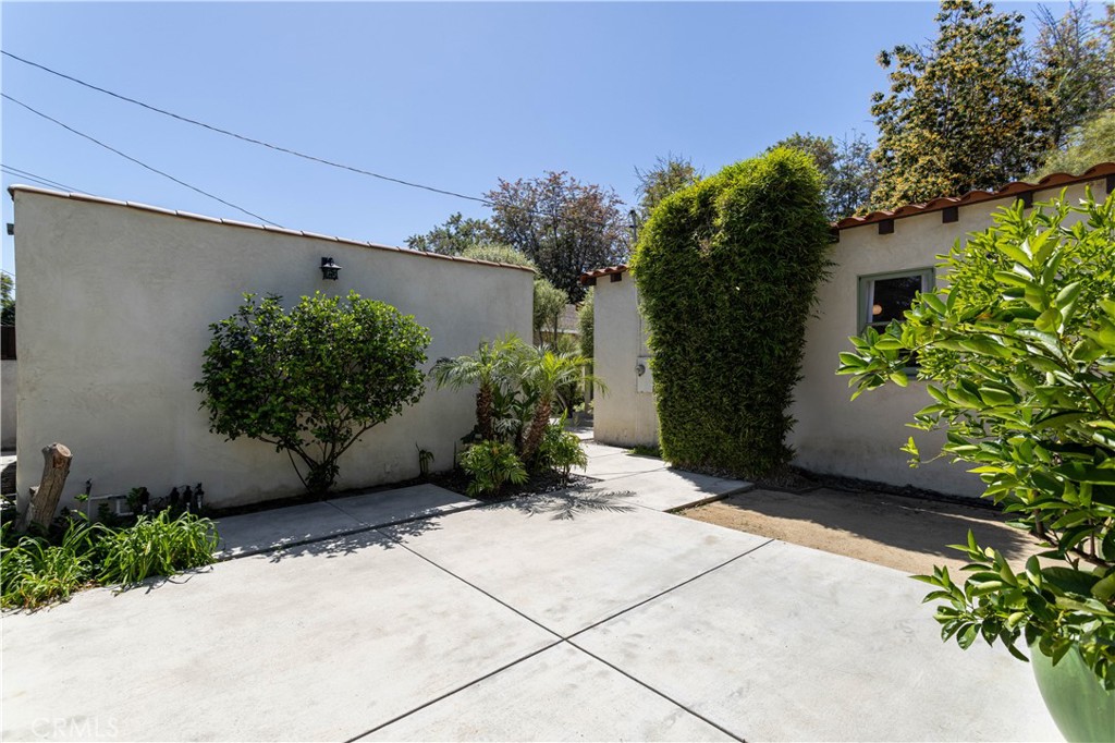 2824 Chestnut Avenue Long Beach, CA 90806 - Photo 40 of 46 backyard patio space, view towards garage and back of house