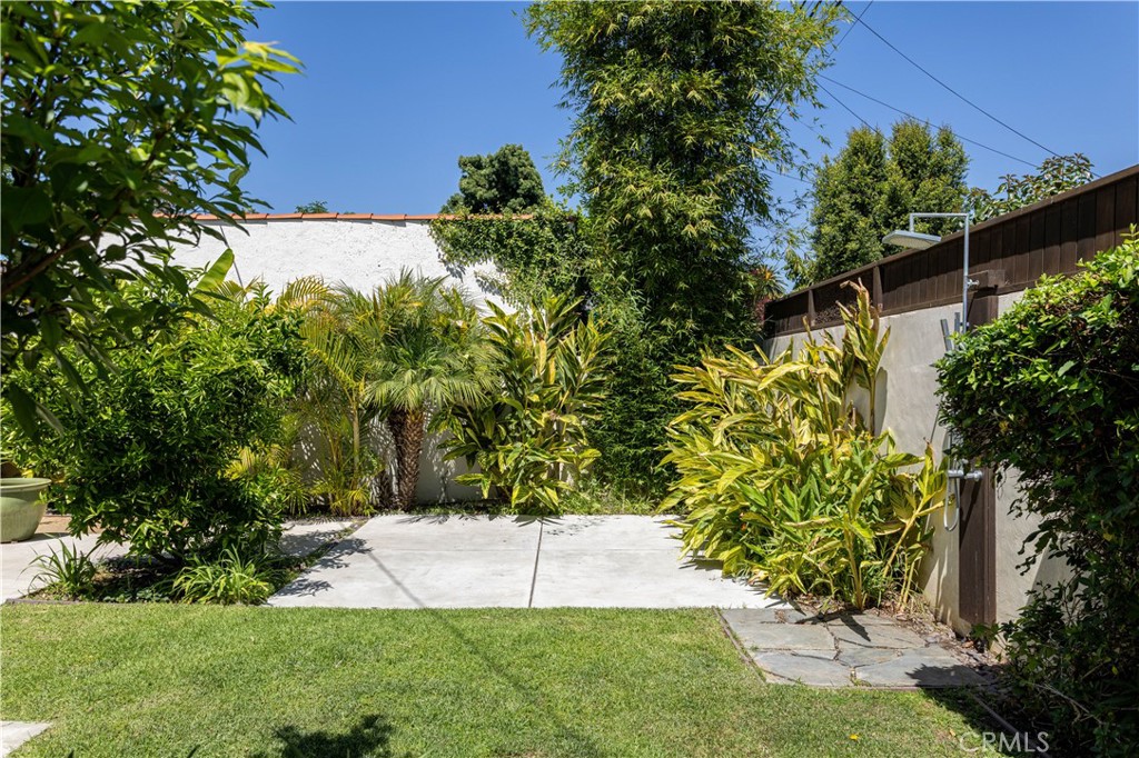 2824 Chestnut Avenue Long Beach, CA 90806 - Photo 43 of 46 backyard grass and patio space