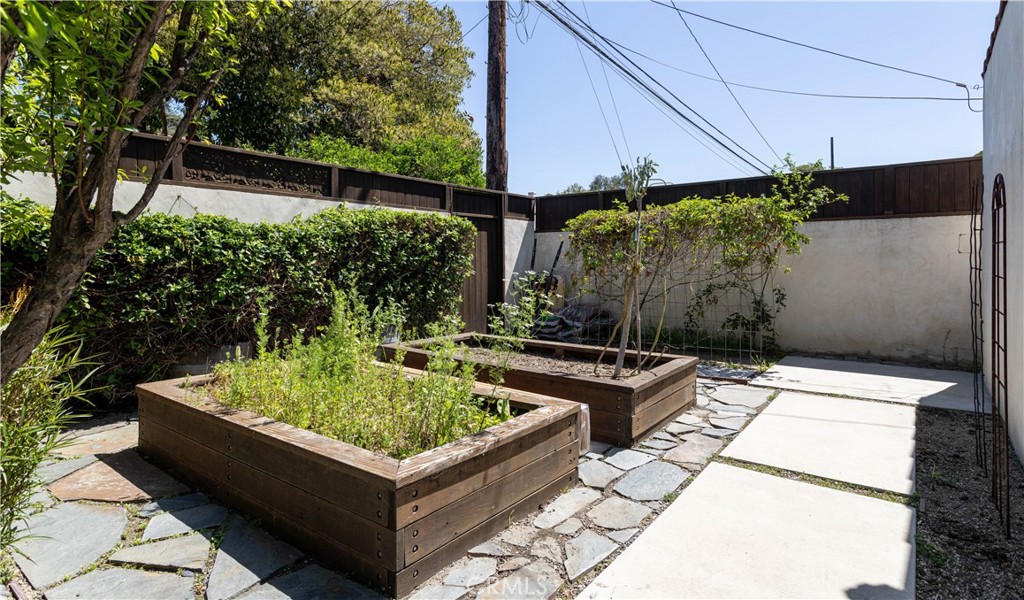 2824 Chestnut Avenue Long Beach, CA 90806 - Photo 45 of 46 backyard raised vegetable beds behind garage