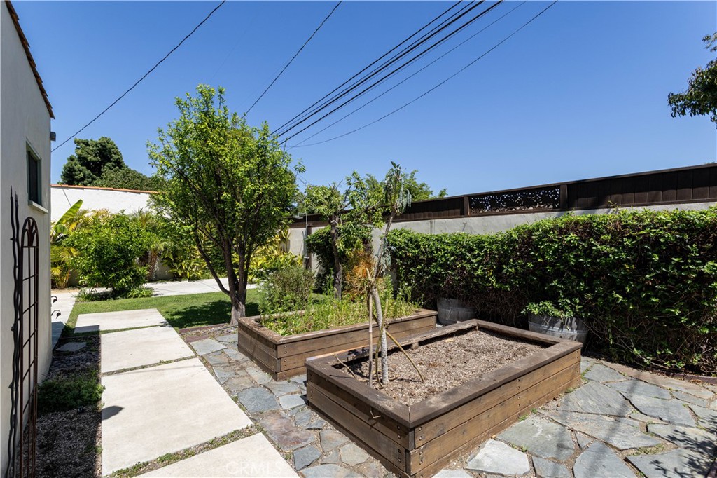 2824 Chestnut Avenue Long Beach, CA 90806 - Photo 46 of 46 opposite view of backyard raised vegetable beds behind garage