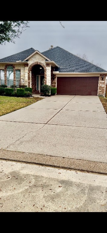 21424 Quail Point Lane Porter, TX 77365 - Photo 1 of 49 a view of building with yard