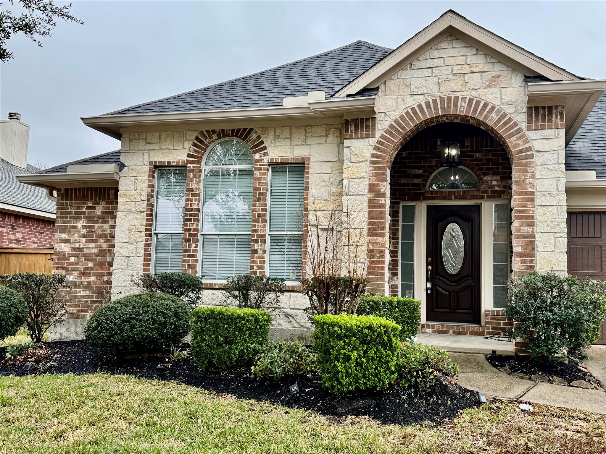 21424 Quail Point Lane Porter, TX 77365 - Photo 2 of 49 a front view of a house with garden