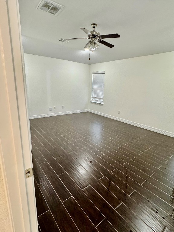 21424 Quail Point Lane Porter, TX 77365 - Photo 27 of 49 a view of an empty room with wooden floor