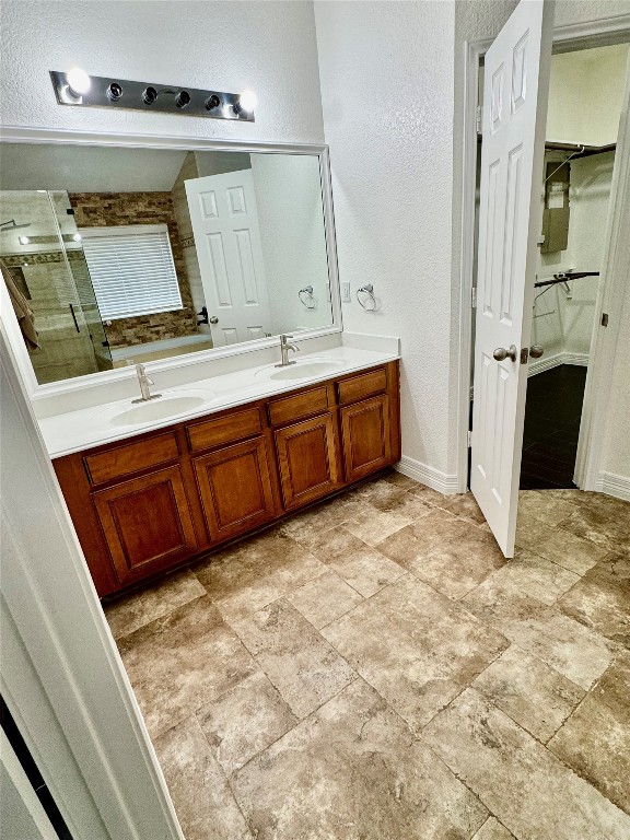 21424 Quail Point Lane Porter, TX 77365 - Photo 31 of 49 a bathroom with a sink and a mirror