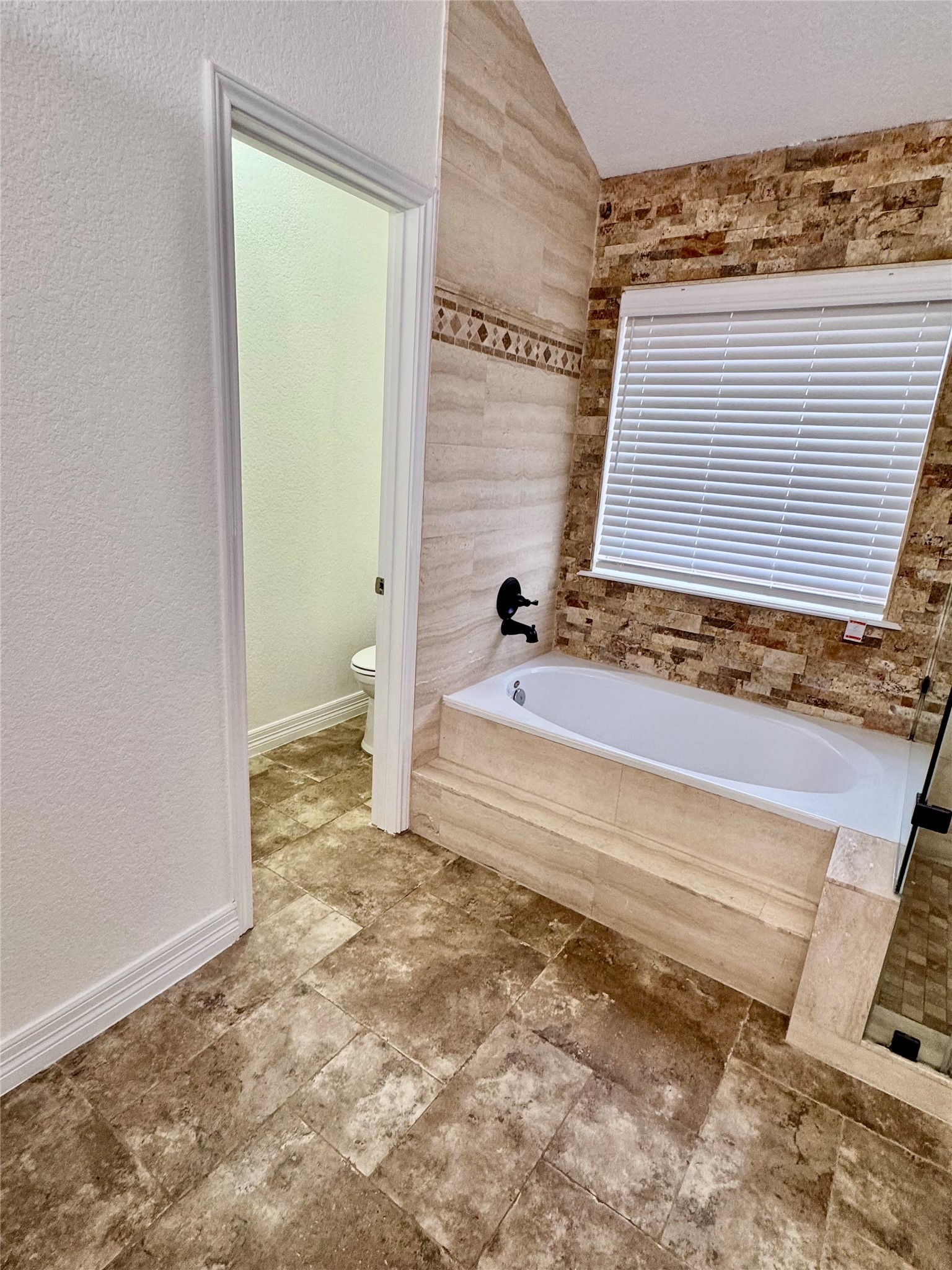 21424 Quail Point Lane Porter, TX 77365 - Photo 33 of 49 a view of a bathroom with a sink and a window