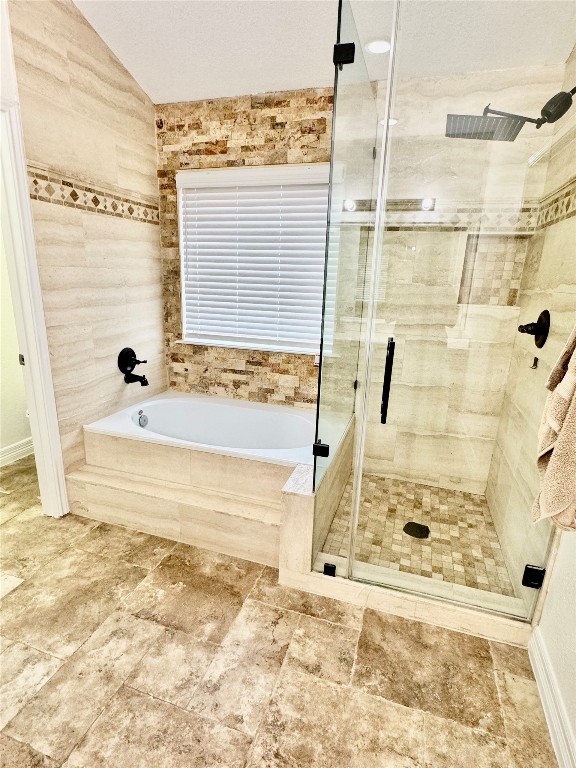 21424 Quail Point Lane Porter, TX 77365 - Photo 35 of 49 a view of a bathroom with a tub and shower