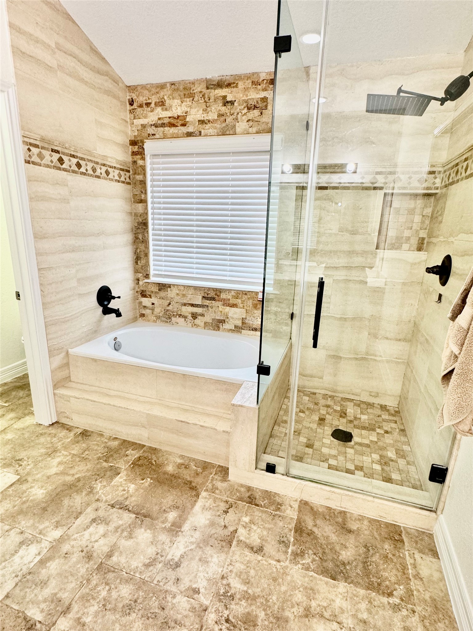 21424 Quail Point Lane Porter, TX 77365 - Photo 35 of 49 a view of a bathroom with a tub and shower