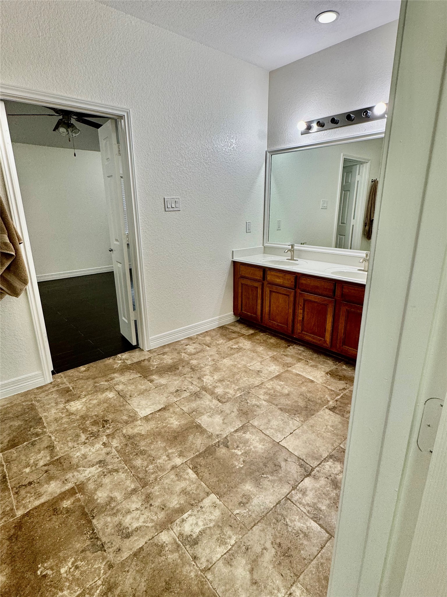 21424 Quail Point Lane Porter, TX 77365 - Photo 37 of 49 a bedroom with a bed and a mirror