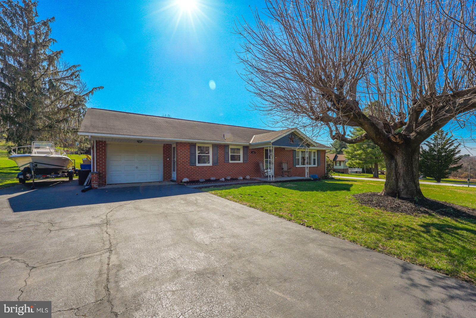 5571 Blooming Grove Road Glenville, PA 17329 - Photo 21 of 29 a view of a house with a yard