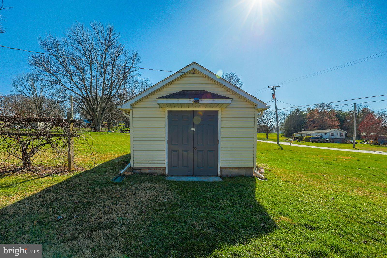 5571 Blooming Grove Road Glenville, PA 17329 - Photo 23 of 29 a view of a house with a yard