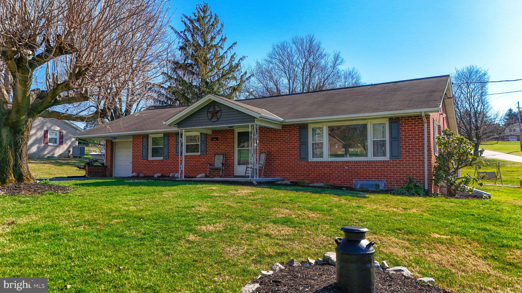 5571 Blooming Grove Road Glenville, PA 17329 - Photo 29 of 29 a front view of a house with yard and green space